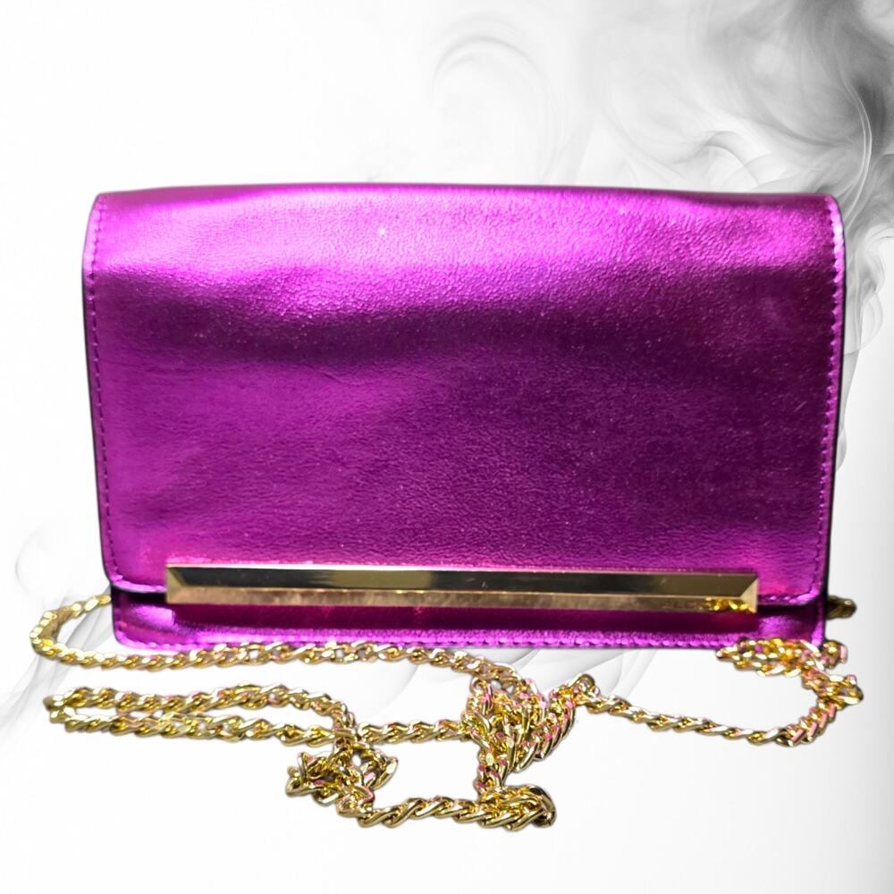 Stunning Aldo metallic fuchsia evening clutch with sleek gold hardware!